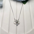 "Raincloud" Premium Sea Pearl Necklace 6mm - 6.5mm with Dark Blue Crystal