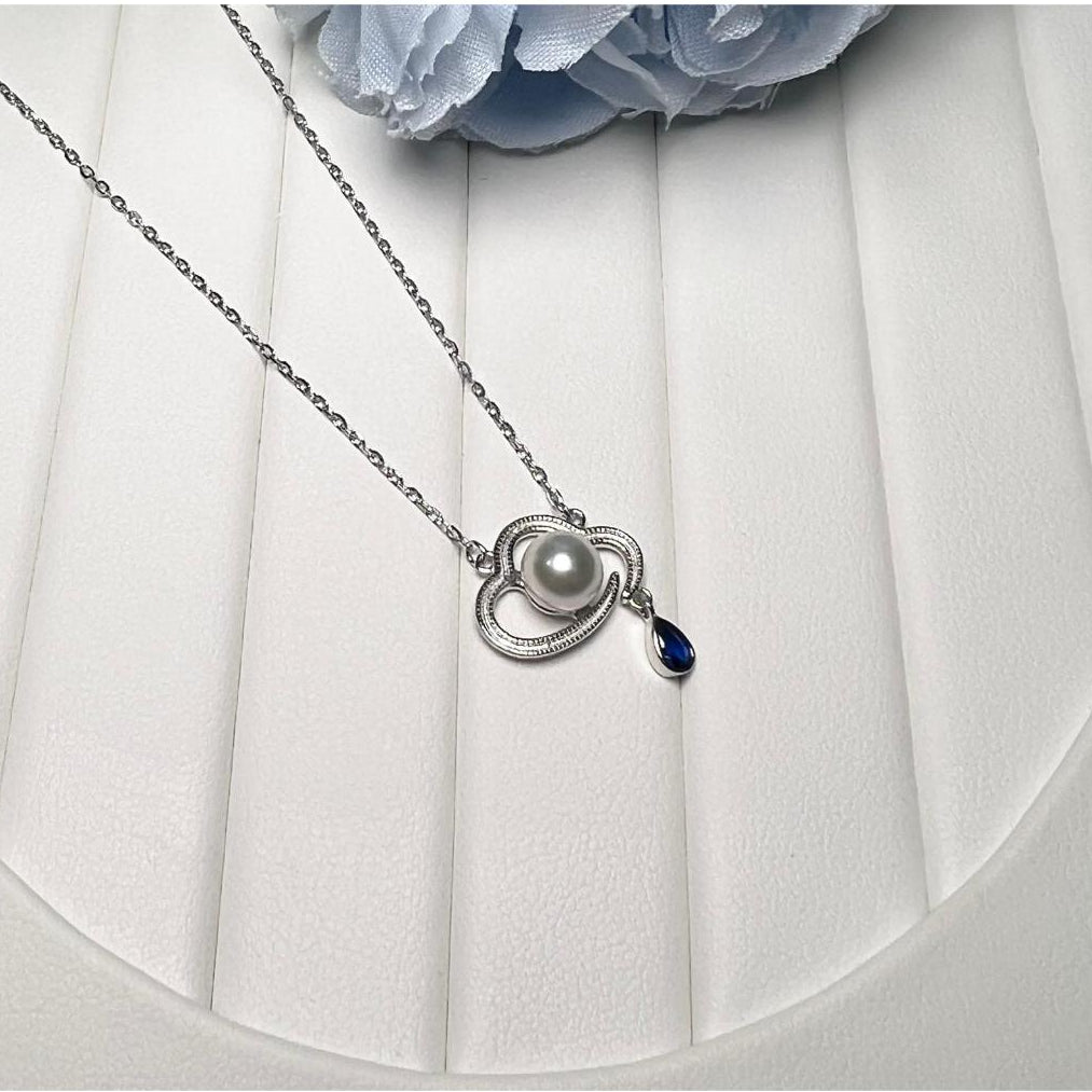 "Raincloud" Premium Sea Pearl Necklace 6mm - 6.5mm with Dark Blue Crystal